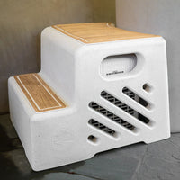 Step stool with wooden platforms and a cooling and filtration unit on a gray floor against a beige wall